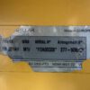 Caterpillar generator end serial number tag F2A00328.