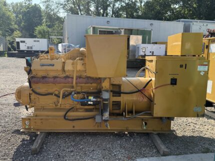 Side view of 1988 Caterpillar 3412 600kW diesel generator with breaker enclosure