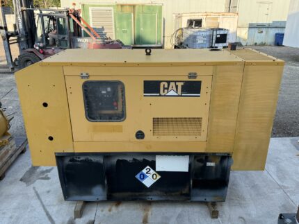 Front view of Caterpillar C4.4 generator enclosure with doors closed.