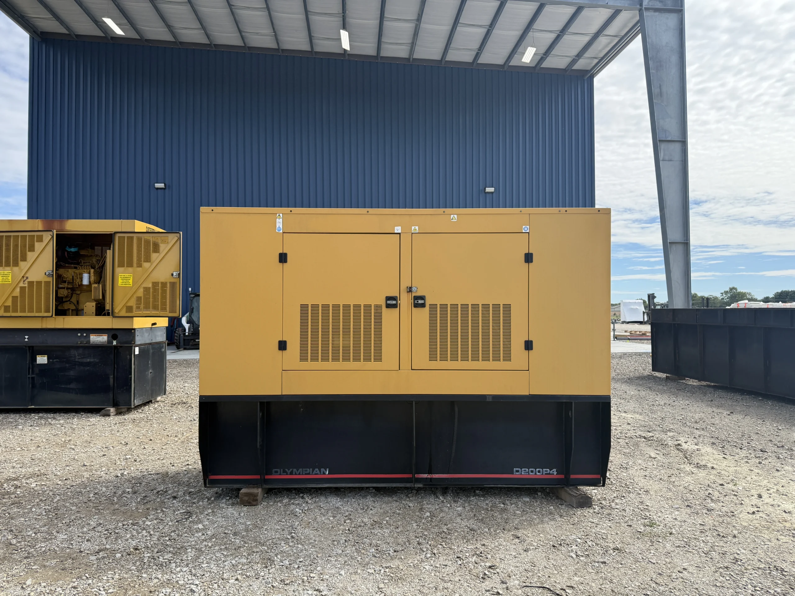 2000-Olympian-D200P4-200kW-F2166F-001-Enclosure-Side-1 2000 Olympian D200P4 200kW Diesel Generator Set - Image 1